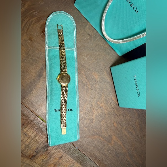Vintage Tiffany & Co. ladies 14k yellow gold watch with diamonds around bezel. - Picture 7 of 12